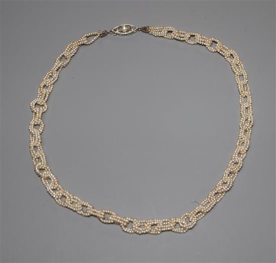 A seed pearl chain link choker necklace, with 18k and diamond set clasp, 35cm.